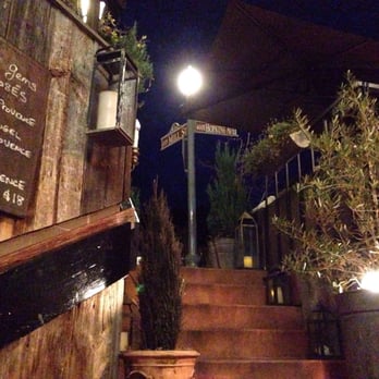 French Alpine Bistro - At the corner of Hopkins and Mills - this is from the downstairs patio looking up to the corner - French Near Me - Aspen, Colorado French Alpine Bistro - At the corner of Hopkins and Mills - this is from the downstairs patio looking up to the corner - French Near Me - Aspen, Colorado