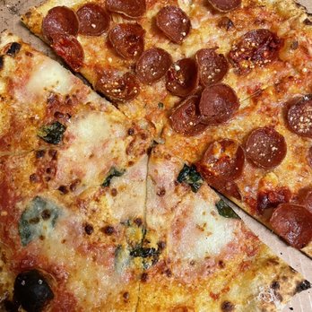 Pizza Bruno - Half of the Margherita Pizza and half of the Pepperoni Pizza - Pizza Near Me - Orlando, Florida Pizza Bruno - Half of the Margherita Pizza and half of the Pepperoni Pizza - Pizza Near Me - Orlando, Florida