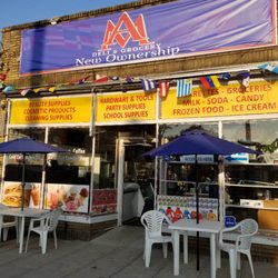 A & M Deli & Grocery - Our weekend set up where we put Bistro tables with shade umbrellas outside