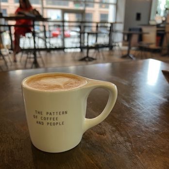 Houndstooth Coffee - 12 oz oat milk latte, with heart - Coffee & Tea Near Me - Austin, Texas