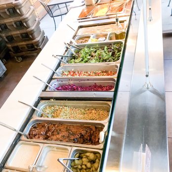 Gotta Eatta Pita - Inside food options- All Natural Chicken Shawarma, Hummus, Purple Cabbage Salad, Greek Style Eggplant. Israeli Couscous etc. - Mediterranean Near Me - Pleasant Hill, California