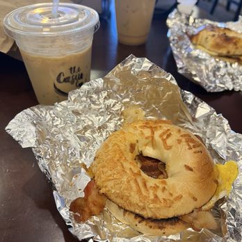 The Casual Cup - Bacon egg and cheese on an Asiago bagel and an iced coffee - Coffee & Tea Near Me - Braintree, Massachusetts