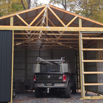 Longacre Repair - a truck parked in a garage - General Contractors Near Me Longacre Repair - a truck parked in a garage - General Contractors Near Me