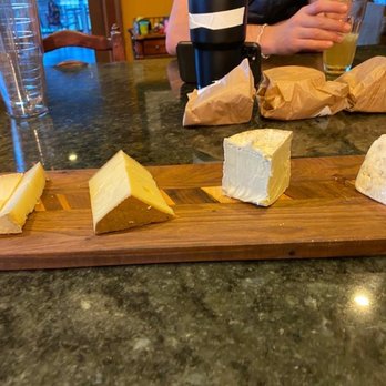 Cheese To You - a person holding a glass of wine - Cheese Shops Near Me - Lexington, Virginia