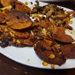 The Stone Lodge - Burnt nachos. Left under the broiler maybe?