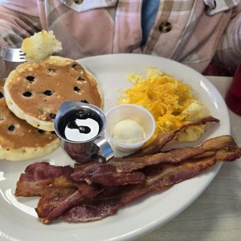 Hugo's Family Restaurant - Blue berry pancake cheesy eggs and bacon - Breakfast & Brunch Near Me - Jenks, Oklahoma Hugo's Family Restaurant - Blue berry pancake cheesy eggs and bacon - Breakfast & Brunch Near Me - Jenks, Oklahoma