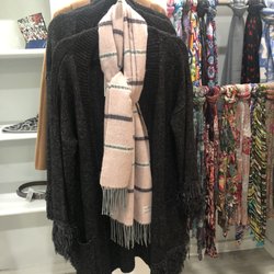 Cachet Boutique - Long cardigan with fringe detail.