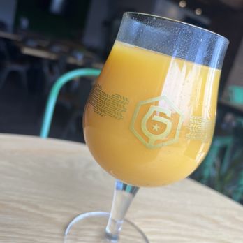 Garth's Brew Bar - a glass of orange juice - Beer Bar Near Me - Madison, Wisconsin Garth's Brew Bar - a glass of orange juice - Beer Bar Near Me - Madison, Wisconsin