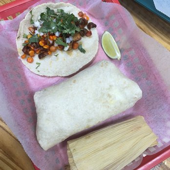 Tacos El Fluffy - Veggie taco (chickpeas, corn, mushrooms), breakfast burrito and cheese and jalapeño tamale. The homemade tortillas are incredible!! - Mexican Near Me - Pensacola, Florida