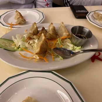 Wok & Roll - Pan fried dumplings are our favorite. - Sushi Bars Near Me - San Marcos, Texas Wok & Roll - Pan fried dumplings are our favorite. - Sushi Bars Near Me - San Marcos, Texas