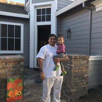 Olvera painting - Martin and his "junior painter" putting  the final touches on our home :) - Painters Near Me - Salida, California