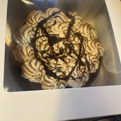 La Patisserie Normande - Brownie cake with merengue frosting. What a delightful treat. I thought it was great, and I don't even like chocolate.