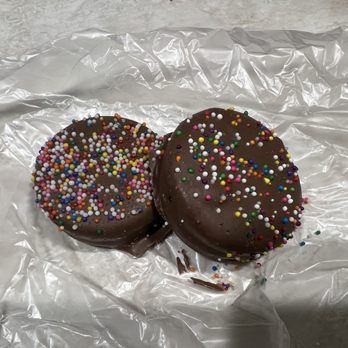 Kilwins - two chocolate donuts with sprinkles - Chocolatiers & Shops Near Me - Myrtle Beach, South Carolina