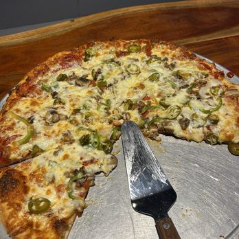 Johnny's New York Style Pizza - Large Johnny's Deluxe with extra cheese and jalapeños. - Pizza Near Me - Grayson, Georgia Johnny's New York Style Pizza - Large Johnny's Deluxe with extra cheese and jalapeños. - Pizza Near Me - Grayson, Georgia