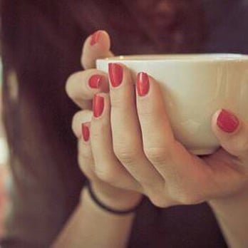 Tylan's Cafe - a woman holding a coffee cup - Cafes Near Me - San Jose, California Tylan's Cafe - a woman holding a coffee cup - Cafes Near Me - San Jose, California