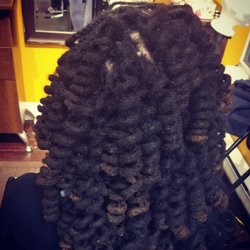 Nannis Natural Hair Studio - Back view. Wash, retwist, & styled Locs. $110 CAD