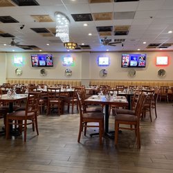 5th Element Indian Bistro & Bar - Our late lunch when most diners had left...they kept playing Indian music videos that added to the cultural experience  great staff & food!