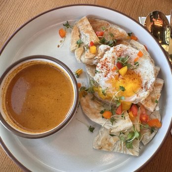 Escape 360 - Southern Style Roti Curry  A flavorful Thai coconut curry served w/ 3 flaky roti pastries & a sunny-side-up egg. - Cafes Near Me - McKinney, Texas