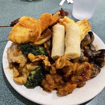 City Buffet - Plate piled with spring rolls, fried white fish, bourbon chicken, General Tso Chicken, bourbon chicken, mushrooms, steak, wontons... - Buffets Near Me - Casselberry, Florida City Buffet - Plate piled with spring rolls, fried white fish, bourbon chicken, General Tso Chicken, bourbon chicken, mushrooms, steak, wontons... - Buffets Near Me - Casselberry, Florida