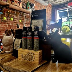 Two Bronze Dogs - Shady Cat Social Club, the very best in Catnip, Silver Vine and Valerian.