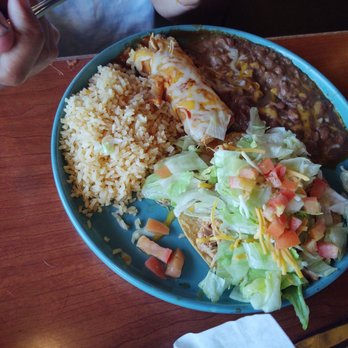 Mi Jalisco - Chicken enchilada with bean tostada. She ate all but the rice. - Mexican Near Me - Ritzville, Washington Mi Jalisco - Chicken enchilada with bean tostada. She ate all but the rice. - Mexican Near Me - Ritzville, Washington