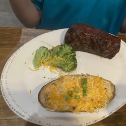 Coulotte with twice baked potato and (half eaten) broccoli