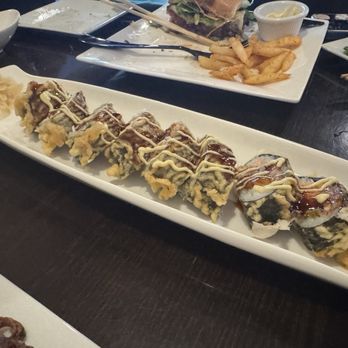 Suxico Sushi - 11:11 - salmon, tuna, escolar and avocado, tempura fried, topped with spicy creamy aioli, eel sauce - Sushi Bars Near Me - Spring, Texas