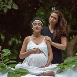 Michelle Orchid Rodriguez,LMBT - Specializing in Prenatal Massage. Michelle (owner) with client. 10/2017