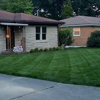 Turf Pro Outdoor Solutions - a lawn in front of a house - Pest Control Near Me - Louisville, Kentucky Turf Pro Outdoor Solutions - a lawn in front of a house - Pest Control Near Me - Louisville, Kentucky
