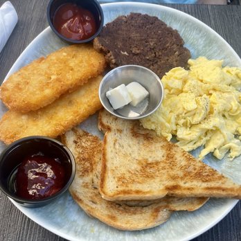 Toast Kitchen & Bakery - Classic Breakfast Plate with vegetarian chorizo, scrambled eggs, crispy hash browns, strawberry jam and toast. - Breakfast & Brunch Near Me - Tustin, California Toast Kitchen & Bakery - Classic Breakfast Plate with vegetarian chorizo, scrambled eggs, crispy hash browns, strawberry jam and toast. - Breakfast & Brunch Near Me - Tustin, California