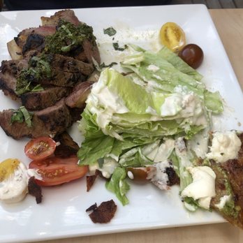 Spoonline Bistro - Flank steak with duck fat potatoes and a wedge salad. - Wine Bars Near Me - Girdwood, Alaska