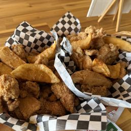 Boneless chicken, half original and half soy sauce -  comes with random pieces of French fries and gyoza (potsticker)