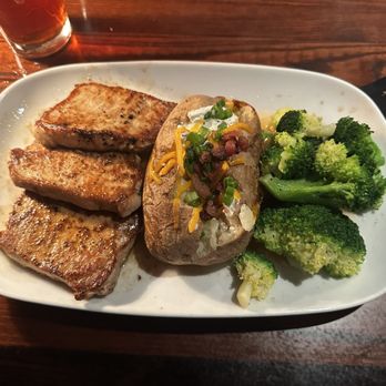 LongHorn Steakhouse - Cowboy Pork Chops and Loaded Baked Potato and Fresh Steamed Broccoli - Steakhouses Near Me - Alabaster, Alabama LongHorn Steakhouse - Cowboy Pork Chops and Loaded Baked Potato and Fresh Steamed Broccoli - Steakhouses Near Me - Alabaster, Alabama