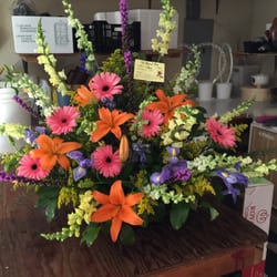 A Touch of Class Florist - Mix basket featuring gerber daisys.