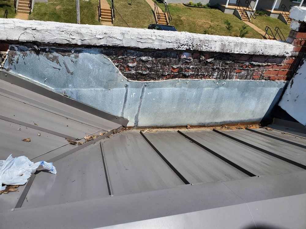 Slide of Powell's Roofing & Remodeling