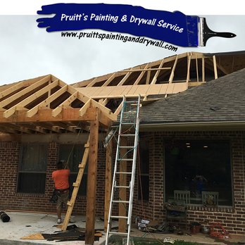 Pruitt's Paint and Drywall - a man working on a roof - Painters Near Me Pruitt's Paint and Drywall - a man working on a roof - Painters Near Me