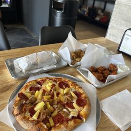 Lunch special pizza, pastrami sandwich and wings. Lunch special pizza, pastrami sandwich and wings.