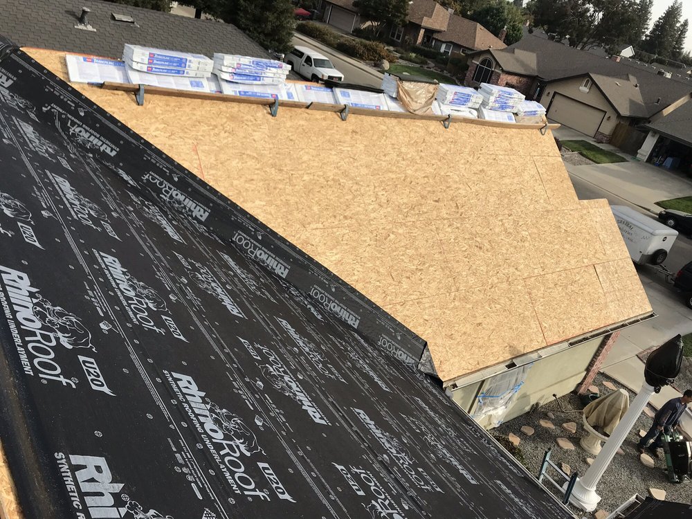 Slide of Oro Valley Roofing