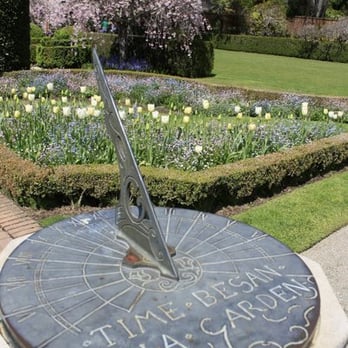 Filoli - sundial with cherry blossom tree in background (Spring 2009) - Botanical Gardens Near Me - Woodside, California Filoli - sundial with cherry blossom tree in background (Spring 2009) - Botanical Gardens Near Me - Woodside, California