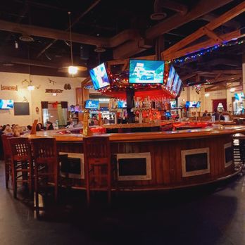 Saddle Ranch - Interior center bar - Steakhouses Near Me - Orange, California Saddle Ranch - Interior center bar - Steakhouses Near Me - Orange, California