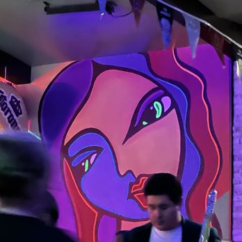 La Sexy Michelada - Mariachi band member and indoor decor. - Mexican Near Me - Colton, California