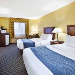 Quality Inn - Comfortable guest room with two beds.