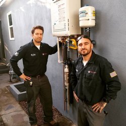 American Plumb Method - Mike and Kyle live on the job installing a tank less water heater