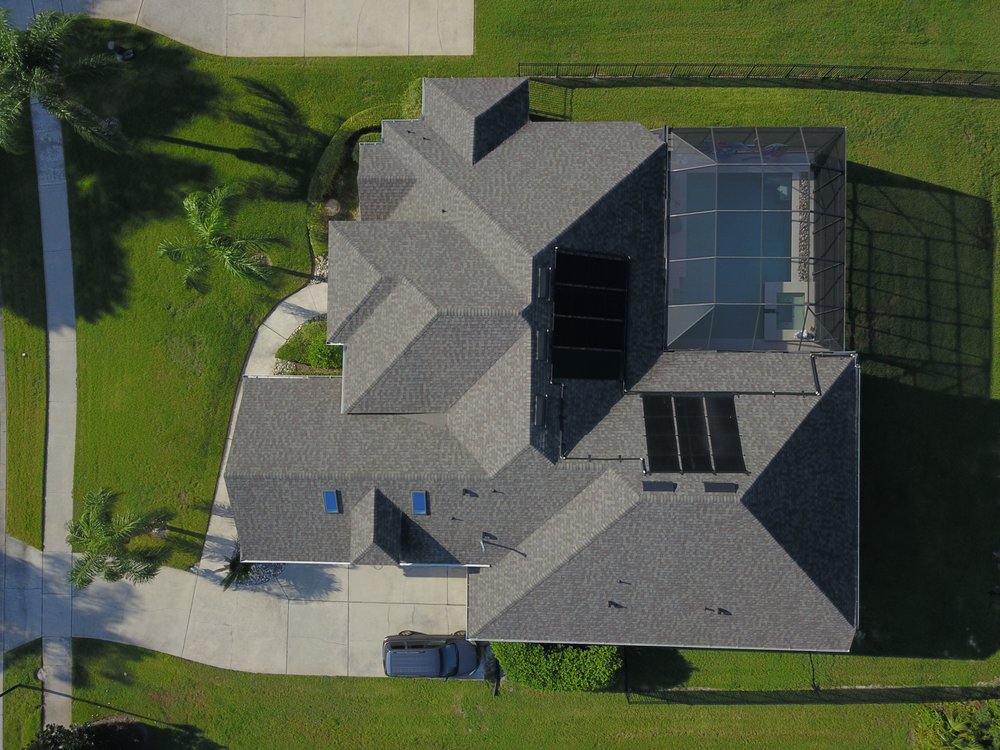 Slide of Roof Pros USA