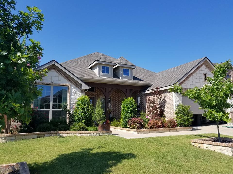 Slide of Ambassador Roofing