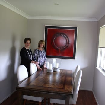 Charcoal Interiors - Colette with her happy client and custom made dining table in parquetry. - Interior Design Near Me - Wilston, QLD