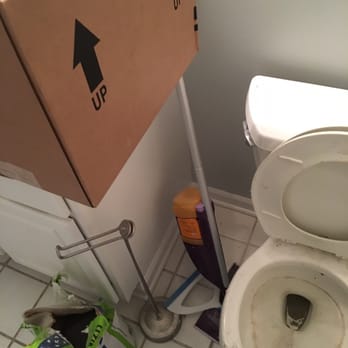 ServiceMaster DSI - Downers Grove - The state of our bathroom two days before move in- cleaning supplies being used, and leveling compound dumped into the toilet. - Carpet Cleaning Near Me - Downers Grove, Illinois