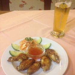 China-Restaurant Pan Asia - Chicken wings appetizer with an Ottakringer beer.