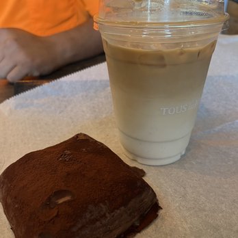 Tous Les Jours - Muddy bun (with my fingerprint) and iced lavender latte. Sooooo goooood. - Bakeries Near Me - Winter Park, Florida Tous Les Jours - Muddy bun (with my fingerprint) and iced lavender latte. Sooooo goooood. - Bakeries Near Me - Winter Park, Florida