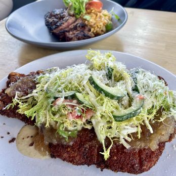 Dodo's - Pork chop (front) and Bavette steak (back). - New American Near Me - Spokane Valley, Washington